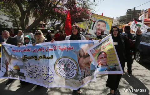 Palestinians take part during a rally marking Palestinian Prisoner Day in Gaza City on April 17, 2016. Photo by Mohammed Asad