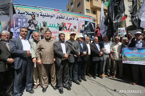 Palestinians take part during a rally marking Palestinian Prisoner Day in Gaza City on April 17, 2016. Photo by Mohammed Asad