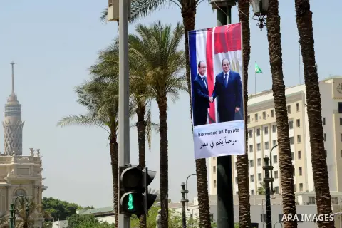 A picture shows a banner welcoming French President Francois Hollande to the country, Cairo, Egypt, April 17, 2016. Photo by Amr Sayed