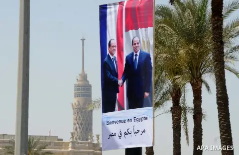 A picture shows a banner welcoming French President Francois Hollande to the country, Cairo, Egypt, April 17, 2016. Photo by Amr Sayed