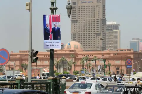 A picture shows a banner welcoming French President Francois Hollande to the country, Cairo, Egypt, April 17, 2016. Photo by Amr Sayed