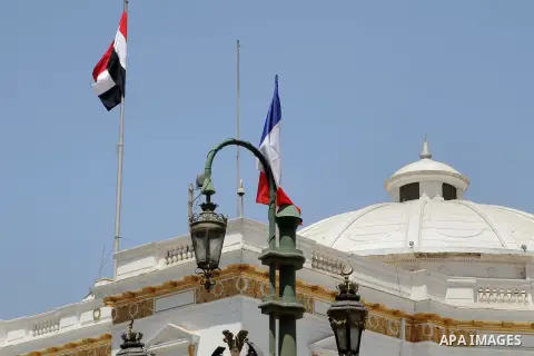 A picture shows Egyptian and French flags welcoming French President Francois Hollande to the country, Cairo, Egypt, April 17, 2016. Photo by Amr Sayed