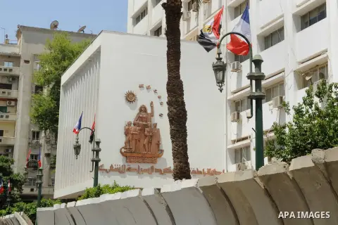 A picture shows Egyptian and French flags welcoming French President Francois Hollande to the country, Cairo, Egypt, April 17, 2016. Photo by Amr Sayed