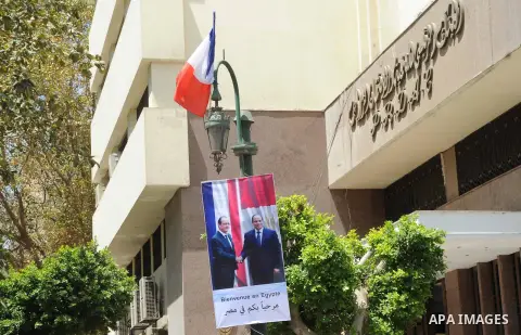 A picture shows a banner welcoming French President Francois Hollande to the country, Cairo, Egypt, April 17, 2016. Photo by Amr Sayed