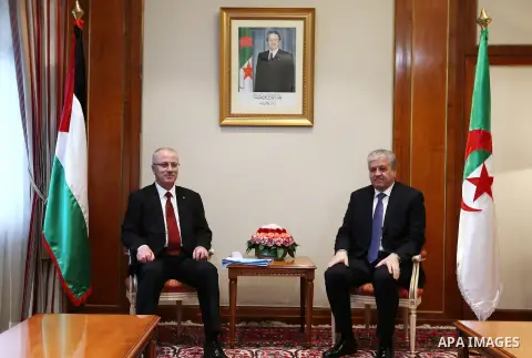 Palestinian Prime Minister Rami Hamdallah meets with Algerian Prime Minister Abdelmalek Sellal during his visit to Algeria, on April 18, 2016. Photo by Prime Minister Office