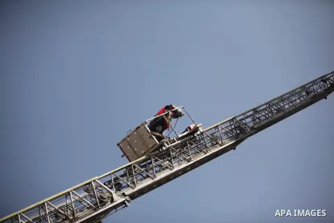 Palestinian emergency personnel take part in a drill in a building which was destroyed during the 50-day war between Israel and Hamas militants in the summer of 2014, in Gaza City, on April 19, 2016. Photo by Ashraf Amra