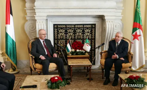President of the Algerian Senate, Abdelkader Bensalah, meets with Palestinian Prime Minister Rami Hamdallah during his visit to Algeria, on April 19, 2016. Photo by Prime Minister Office