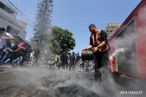 Palestinian owners of houses which were destroyed during the recent Israeli war, take part in a protest, in front of high commissioner for human rights headquarters, in Gaza City on April 20, 2016. Israeli occupation pri...