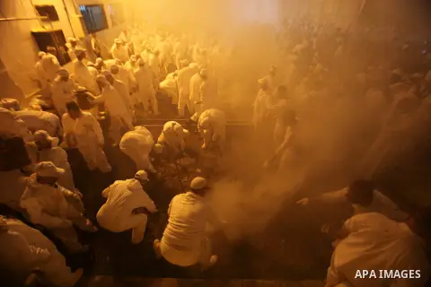 Members of the ancient Samaritan community participate in the ritual of Passover Sacrifice on Mount Grizim, overlooking the West Bank town of Nablus, April 20, 2016. Samaritans descended from the ancient Israelite tribes...