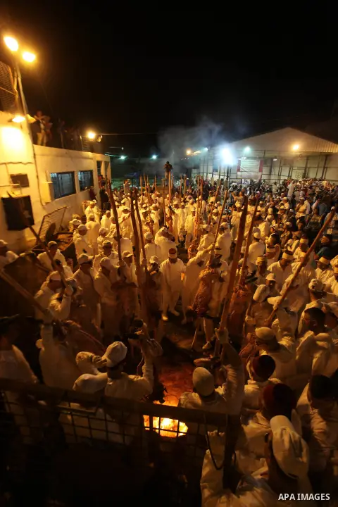 Members of the ancient Samaritan community participate in the ritual of Passover Sacrifice on Mount Grizim, overlooking the West Bank town of Nablus, April 20, 2016. Samaritans descended from the ancient Israelite tribes...