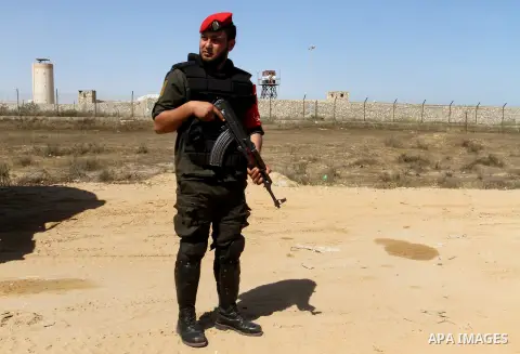 A member of Palestinian security forces loyal to Hamas looks on as he is deployed to maintain security on the border of southern Gaza Strip with Egypt, April 21, 2016. Hamas began deploying additional forces on the Gaza...