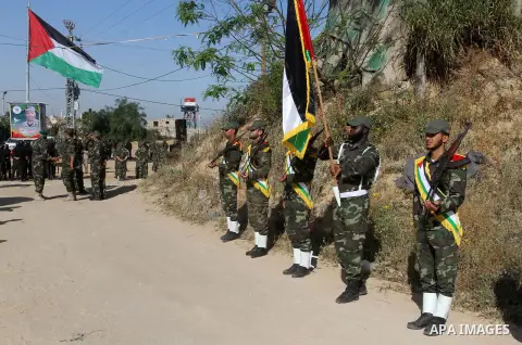 Members of Palestinian security forces loyal to Hamas salute as they are deployed to maintain security on the border of southern Gaza Strip with Egypt, April 21, 2016. Hamas began deploying additional forces on the Gaza...
