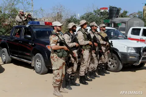 Members of Palestinian security forces loyal to Hamas stand guard as they are deployed to maintain security on the border of southern Gaza Strip with Egypt, April 21, 2016. Hamas began deploying additional forces on the...
