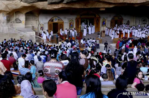 Egyptian Coptic Christian attend the Palm Sunday celebrations at the Deir Samaan Church in Cairo, Egypt, Saturday, April 24, 2016. Photo by Amr Sayed