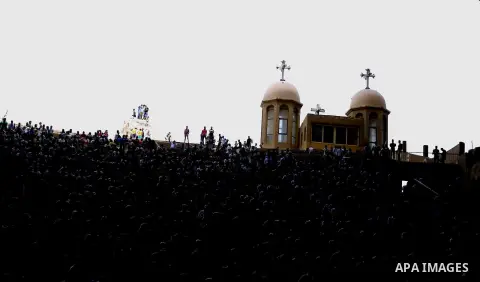 Egyptian Coptic Christian attend the Palm Sunday celebrations at the Deir Samaan Church in Cairo, Egypt, Saturday, April 24, 2016. Photo by Amr Sayed