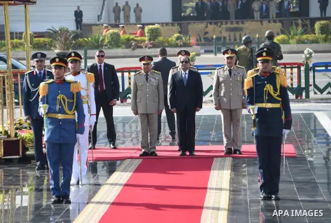 Egyptian President Abdel Fattah al-Sisi lays a wreath at the memorial to the martyrs of the Armed Forces to mark the anniversary of the liberation of Sinai, in Cairo on April 24, 2016. Photo by Egyptian President Office