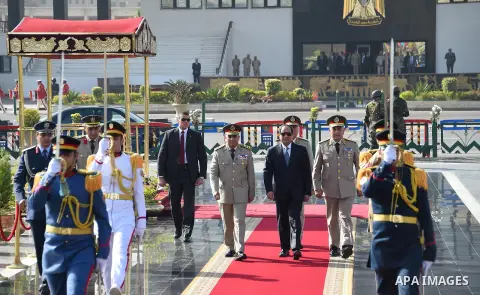 Egyptian President Abdel Fattah al-Sisi lays a wreath at the memorial to the martyrs of the Armed Forces to mark the anniversary of the liberation of Sinai, in Cairo on April 24, 2016. Photo by Egyptian President Office