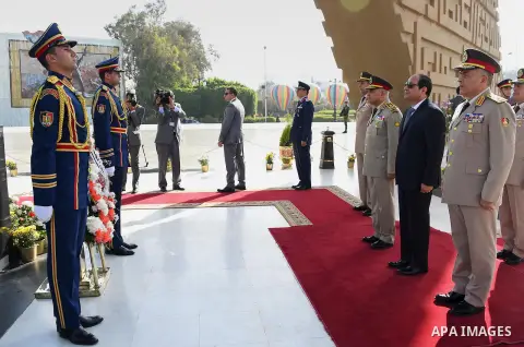 Egyptian President Abdel Fattah al-Sisi lays a wreath at the memorial to the martyrs of the Armed Forces to mark the anniversary of the liberation of Sinai, in Cairo on April 24, 2016. Photo by Egyptian President Office
