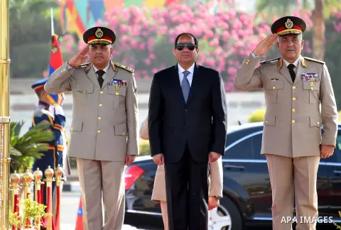 Egyptian President Abdel Fattah al-Sisi lays a wreath at the memorial to the martyrs of the Armed Forces to mark the anniversary of the liberation of Sinai, in Cairo on April 24, 2016. Photo by Egyptian President Office