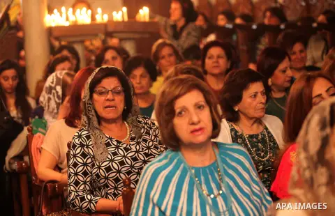 Palestinian Christians take part in the Greek Orthodox Christian Palm Sunday celebrations at St.Porphyrios Church in Gaza City, on April 24, 2016. Palm Sunday marks the triumphant return of Jesus Christ to Jerusalem when...
