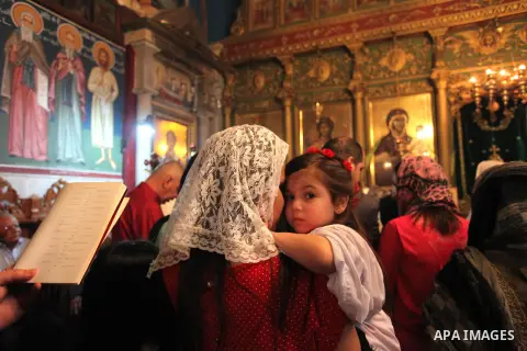 Palestinian Christians take part in the Greek Orthodox Christian Palm Sunday celebrations at St.Porphyrios Church in Gaza City, on April 24, 2016. Palm Sunday marks the triumphant return of Jesus Christ to Jerusalem when...