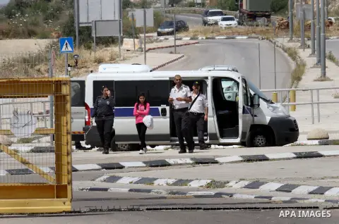 Released Palestinian prisoner Deema Al-Wawi, 12, who was detained by Israeli authorities for around two and half months, arrives following her release near the West Bank city of Tulkarm April 24, 2016. Photo by Nedal Esh...
