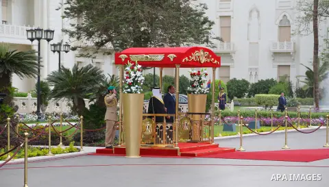 A handout picture released by the Egyptian Presidency on April 26, 2016 shows Egyptian President Abdel Fattah al-Sisi and Bahrain's King Hamad bin Issa al-Khalifa reviewing the honor guard during a welcoming ceremony in...
