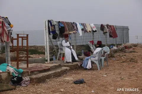 Members of the Samaritan sect take part in a traditional pilgrimage marking the holiday of Passover atop Mount Gerizim near the West Bank city of Nablus, on April 27, 2015. Photo by Nedal Eshtayah