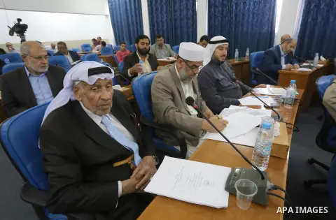 Members of the Palestinian legislative council from Hamas movement attend a meeting at the legislative council in Gaza city on, on April 27, 2016. Photo by Mohammed Asad