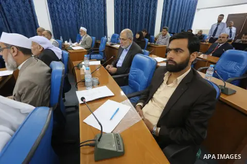 Members of the Palestinian legislative council from Hamas movement attend a meeting at the legislative council in Gaza city on, on April 27, 2016. Photo by Mohammed Asad