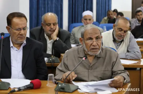 Members of the Palestinian legislative council from Hamas movement attend a meeting at the legislative council in Gaza city on, on April 27, 2016. Photo by Mohammed Asad