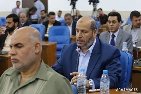 Members of the Palestinian legislative council from Hamas movement attend a meeting at the legislative council in Gaza city on, on April 27, 2016. Photo by Mohammed Asad