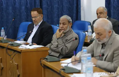 Members of the Palestinian legislative council from Hamas movement attend a meeting at the legislative council in Gaza city on, on April 27, 2016. Photo by Mohammed Asad