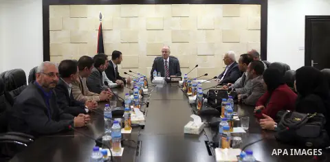 Palestinian Prime Minister, Rami Hamdallah, meets with General Federation of Teachers, in the West bank city of Ramallah, on April 27, 2016. Photo by Prime Minister Office