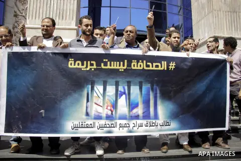 Egyptian Journalists take part during a protest against the restriction of press freedom and to demand the release of detained journalists, in Cairo, Egypt, on April 28, 2016. Photo by Amr Sayed