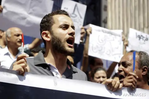 Egyptian Journalists take part during a protest against the restriction of press freedom and to demand the release of detained journalists, in Cairo, Egypt, on April 28, 2016. Photo by Amr Sayed