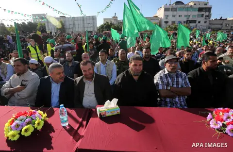 Palestinian supporters of the Islamist movement Hamas take part during an anti-Israel rally in Gaza City on April 28, 2016. Photo by Mohammed Asad