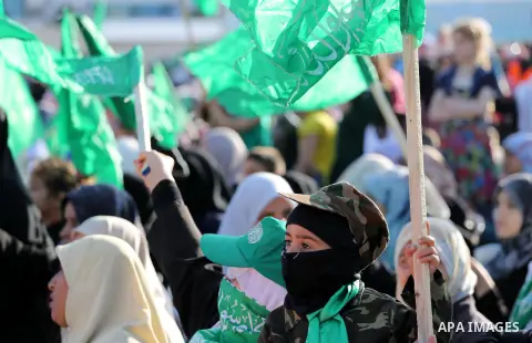 Palestinian supporters of the Islamist movement Hamas take part during an anti-Israel rally in Gaza City on April 28, 2016. Photo by Mohammed Asad