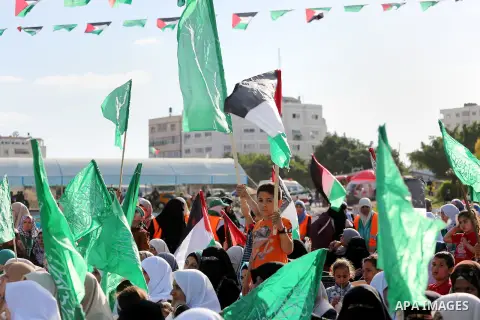 Palestinian supporters of the Islamist movement Hamas take part during an anti-Israel rally in Gaza City on April 28, 2016. Photo by Mohammed Asad