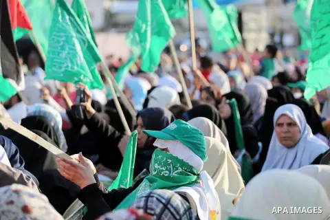 Palestinian supporters of the Islamist movement Hamas take part during an anti-Israel rally in Gaza City on April 28, 2016. Photo by Mohammed Asad