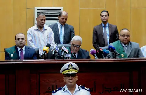 The Judges attend the trial of Egyptian defendants over a 2012 stadium riot in the canal city of Port Said at the police academy on the outskirts of the capital Cairo on April 30, 2016. Seven defendants wait for the verd...