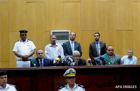 The Judges attend the trial of Egyptian defendants over a 2012 stadium riot in the canal city of Port Said at the police academy on the outskirts of the capital Cairo on April 30, 2016. Seven defendants wait for the verd...
