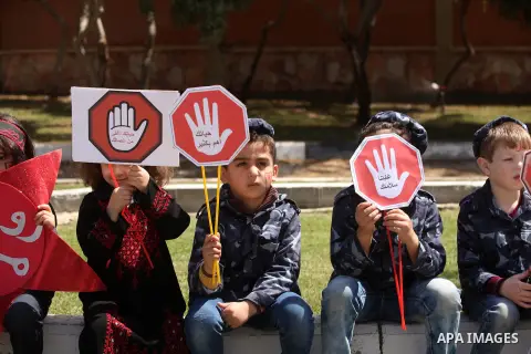 Palestinian children take part during a day where the traffic police have increased presence in the streets to raise traffic awareness in Gaza City on May 4, 2016. Photo by Ashraf Amra