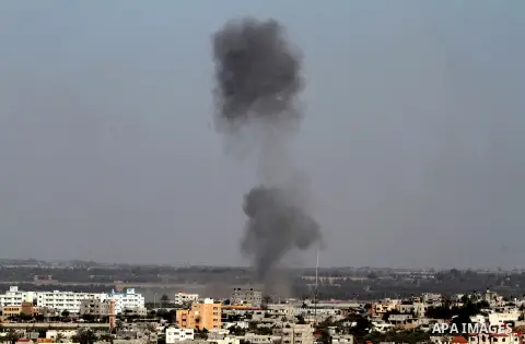 Smoke rises following an Israeli air strike in Rafah, in the southern Gaza Strip, on May 5, 2016. Israeli warplanes struck four new Hamas positions in the southern Gaza Strip, as a flare-up continued to threaten a 2014 c...