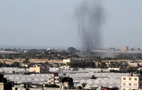 Smoke rises following an Israeli air strike in Rafah, in the southern Gaza Strip, on May 5, 2016. Israeli warplanes struck four new Hamas positions in the southern Gaza Strip, as a flare-up continued to threaten a 2014 c...