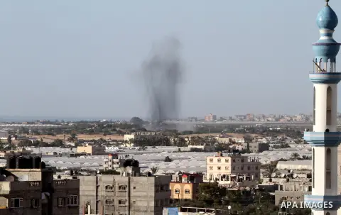 Smoke rises following an Israeli air strike in Rafah, in the southern Gaza Strip, on May 5, 2016. Israeli warplanes struck four new Hamas positions in the southern Gaza Strip, as a flare-up continued to threaten a 2014 c...
