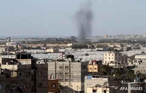 Smoke rises following an Israeli air strike in Rafah, in the southern Gaza Strip, on May 5, 2016. Israeli warplanes struck four new Hamas positions in the southern Gaza Strip, as a flare-up continued to threaten a 2014 c...
