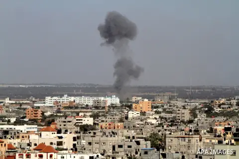 Smoke rises following an Israeli air strike in Rafah, in the southern Gaza Strip, on May 5, 2016. Israeli warplanes struck four new Hamas positions in the southern Gaza Strip, as a flare-up continued to threaten a 2014 c...
