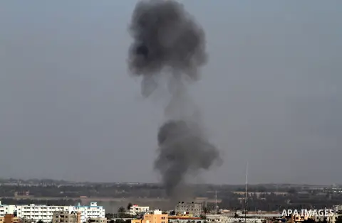 Smoke rises following an Israeli air strike in Rafah, in the southern Gaza Strip, on May 5, 2016. Israeli warplanes struck four new Hamas positions in the southern Gaza Strip, as a flare-up continued to threaten a 2014 c...