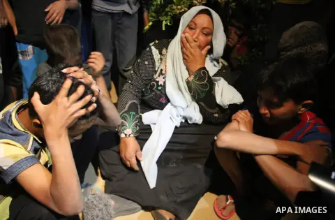 Relatives of Zine al-Umur, 55, who lost her life after Israeli warplanes bombed around Gaza's southern, during a funeral ceremony in east of the Rafah city, Gaza on May 5, 2016.. Photo by Ramadan Elagha